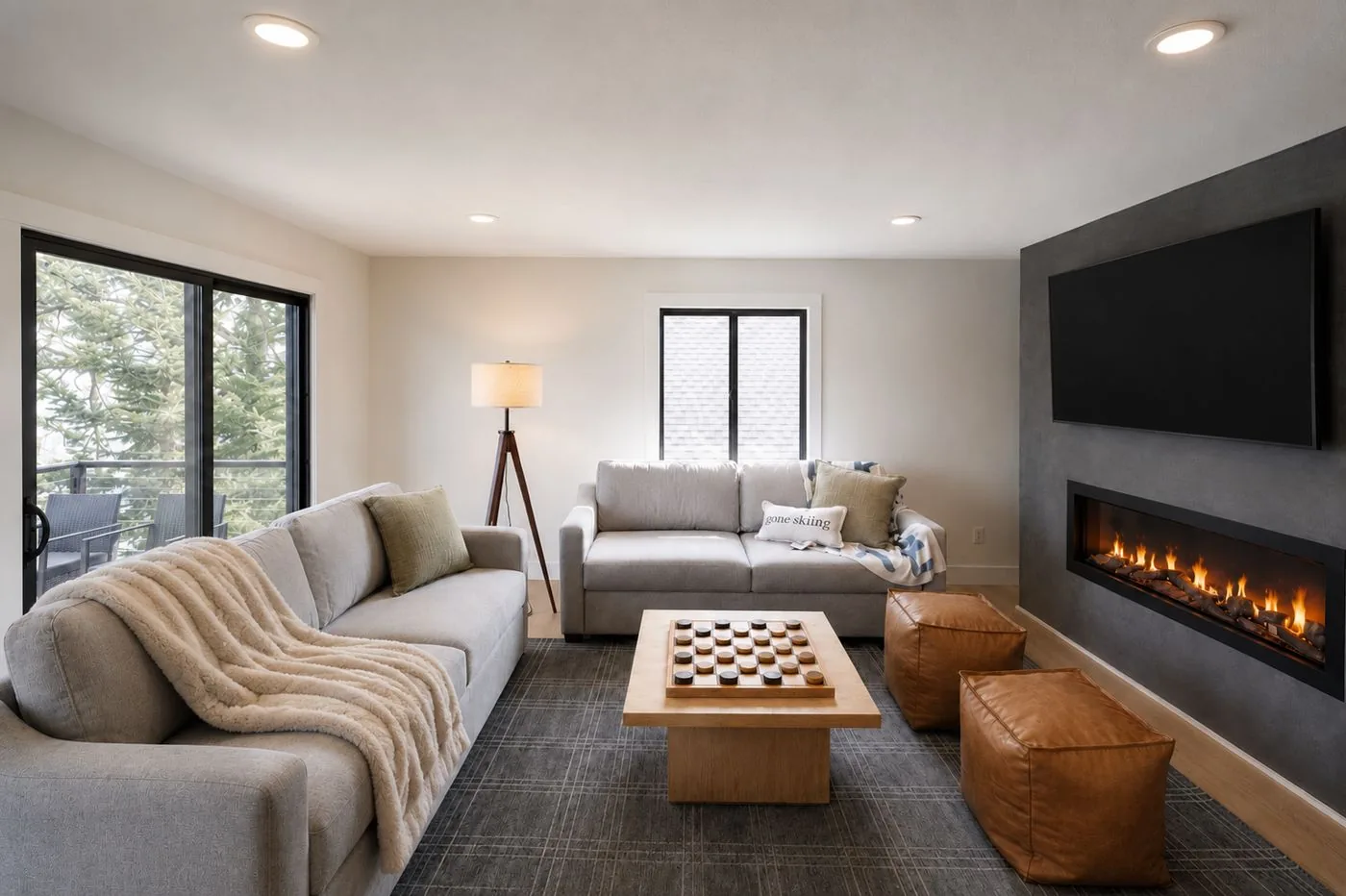 Living room with fireplace and deck access