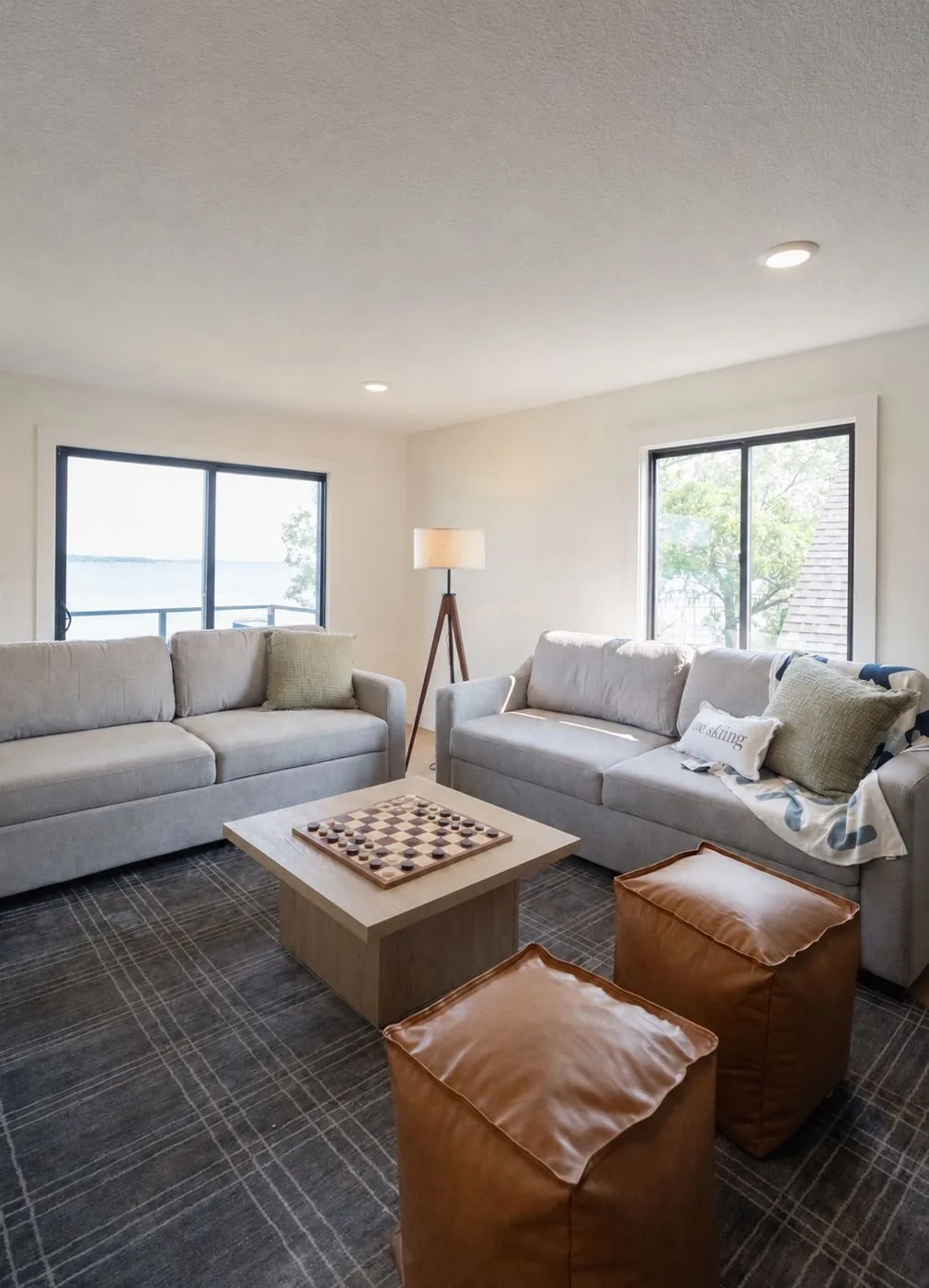 Living room with lake view and games table