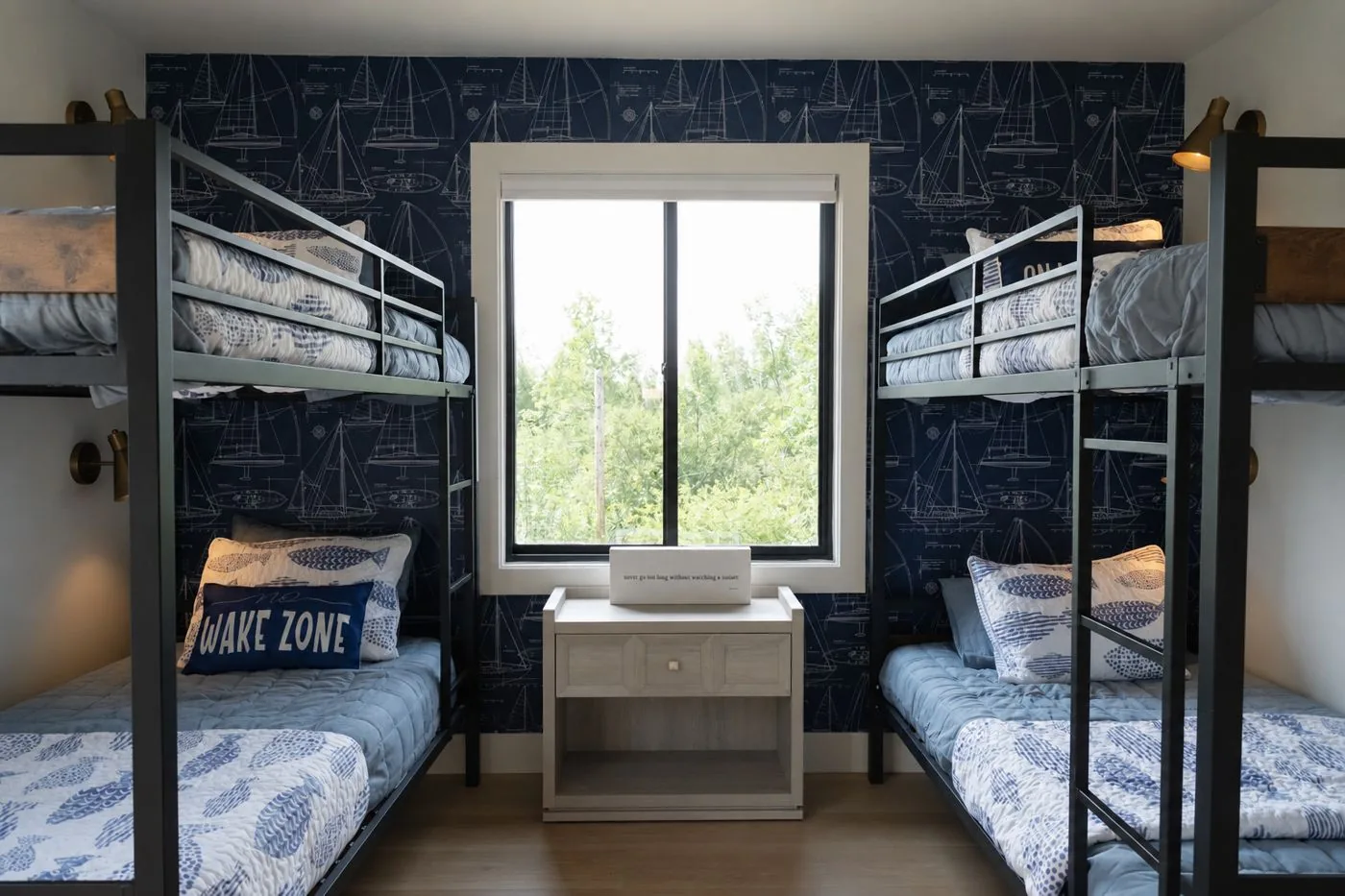 Bunk-bed bedroom with nautical wallpaper