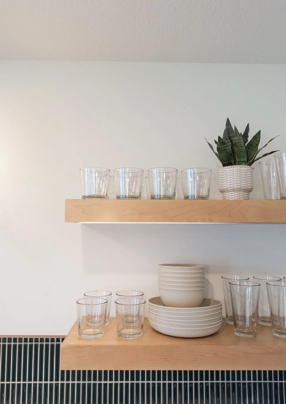Open shelving with glassware and dishes