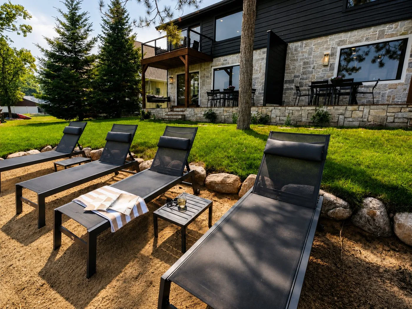 Loungers on the beach below the villas