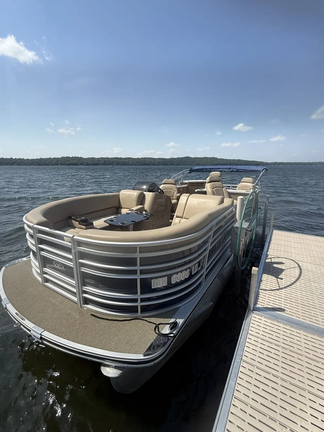 Harris Solstice 220 pontoon docked on East Gull Lake
