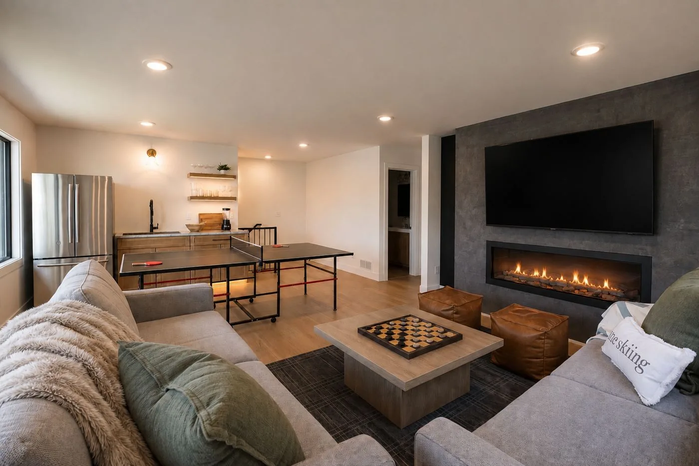 Rec room with ping pong, bar and big-screen TV