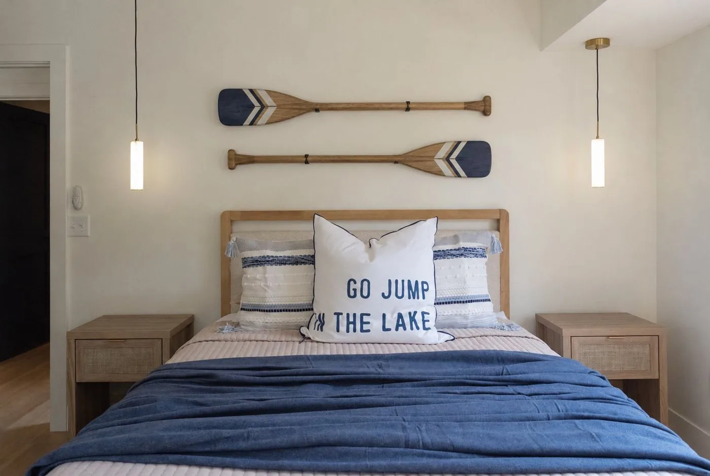 Lakeside bedroom with paddle decor