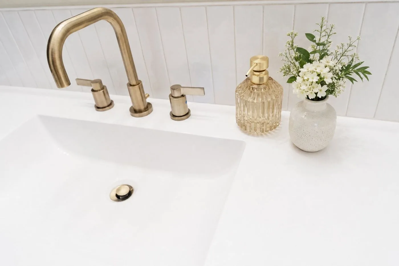 Vanity with brass fixtures