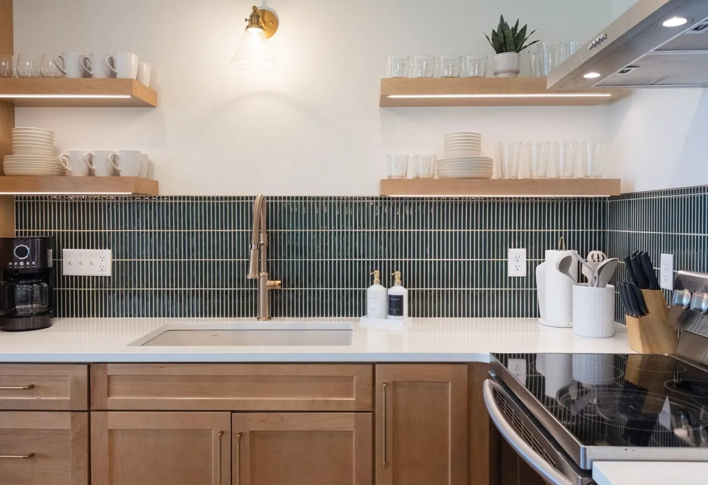 Kitchen with quartz counters and stainless range